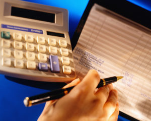 Woman Balancing Her Checkbook